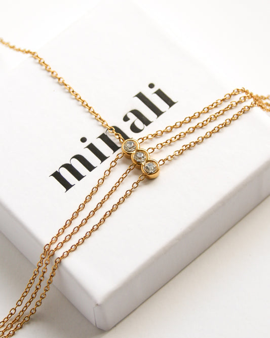 Celeste Handchain in gold